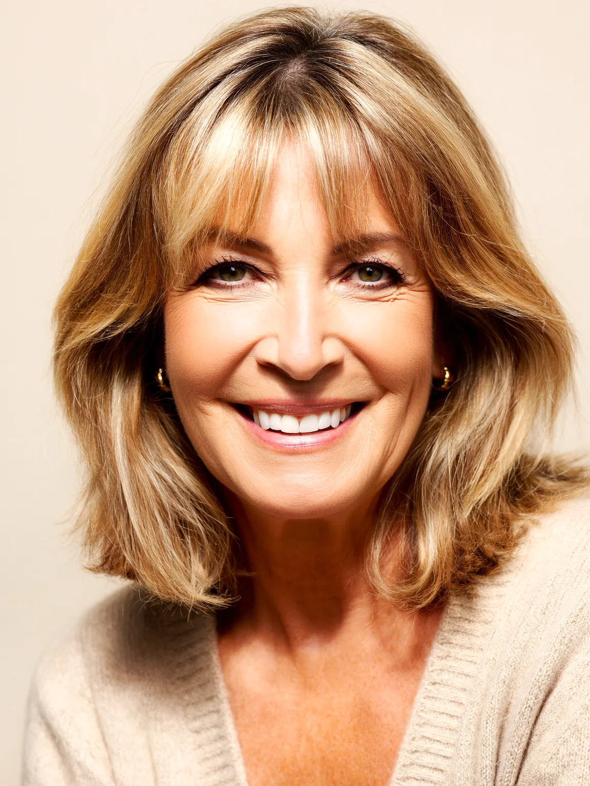 Layered Shoulder-Length Bob with Honey Blonde Highlights